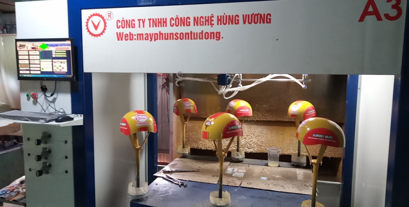 mấy phun sơn mũ bảo hiểm cho công ty Gia Lê